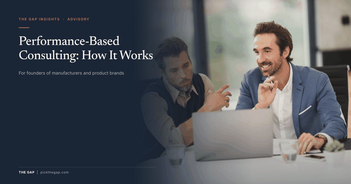 Performance-Based Consulting: How It Works – two executives reviewing plans at a laptop in a meeting room, The GAP